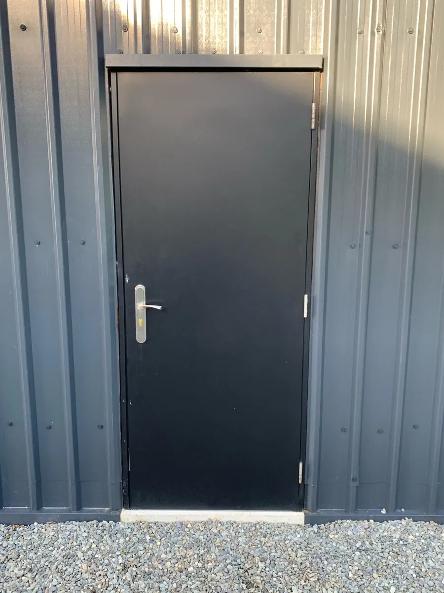 Grey steel personnel door