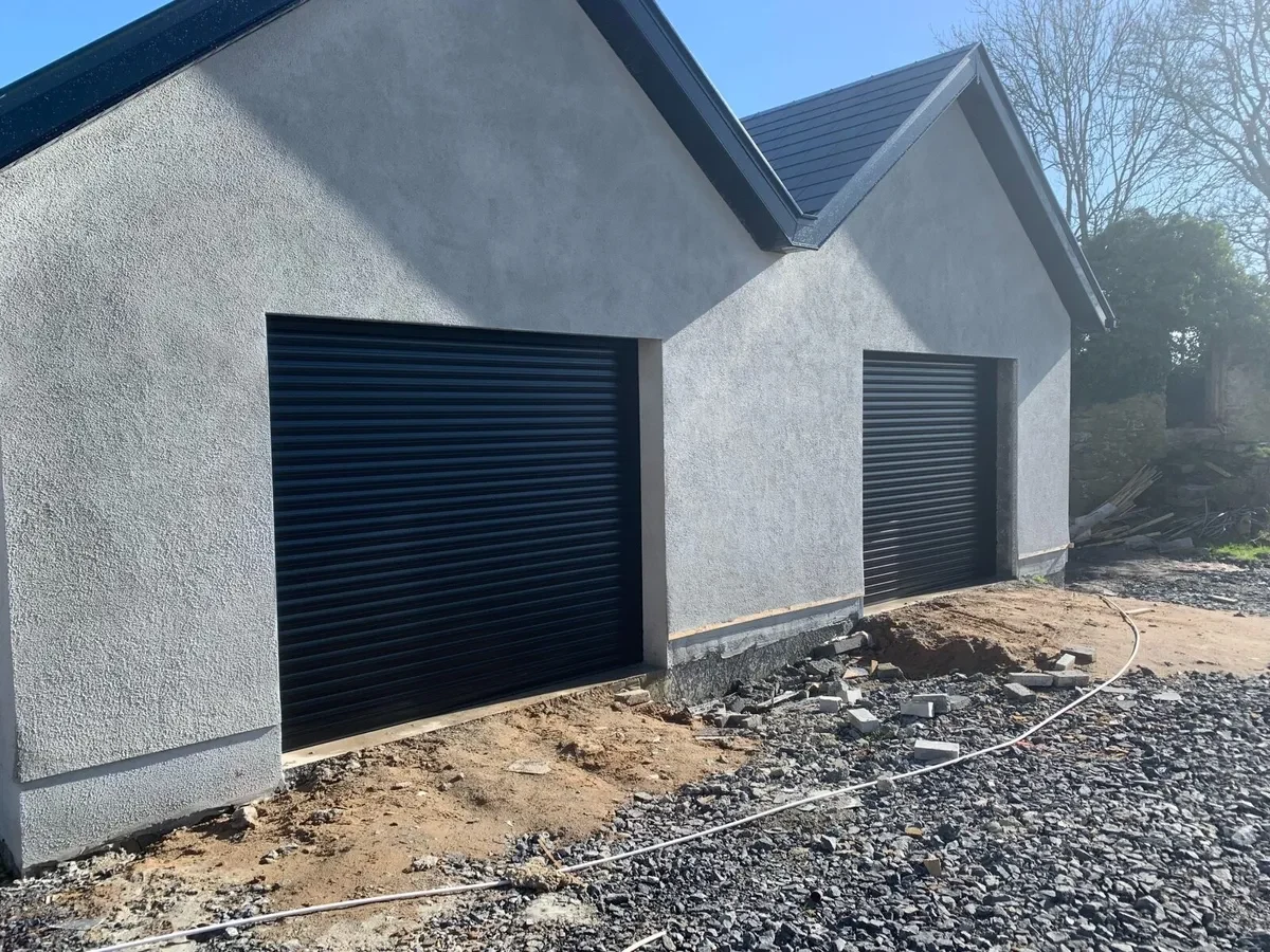 Twin roller doors rendered garage